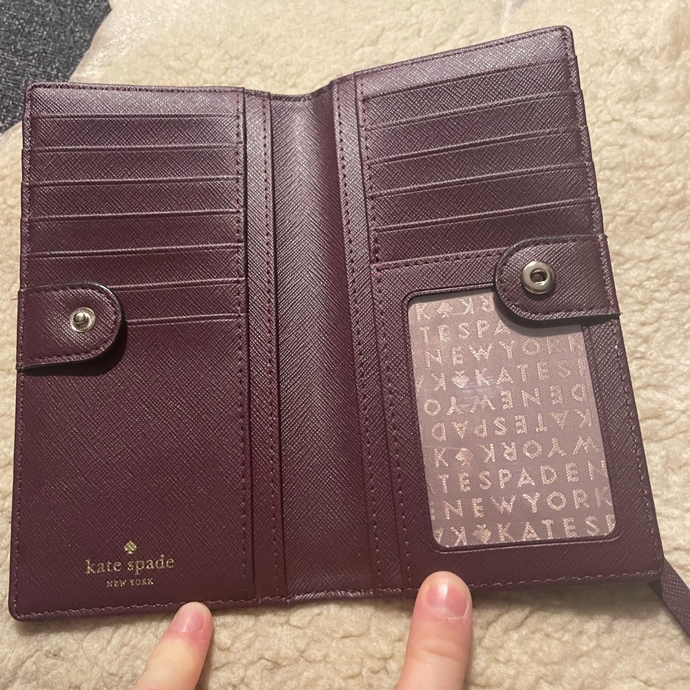 Eggplant purple Kate Spade bifold wallet